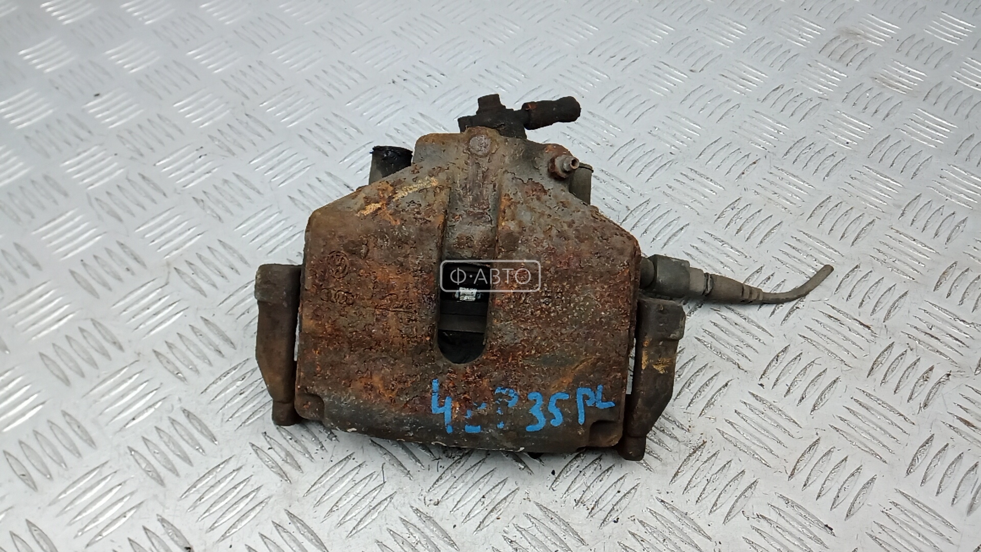 Суппорт тормозной передний левый