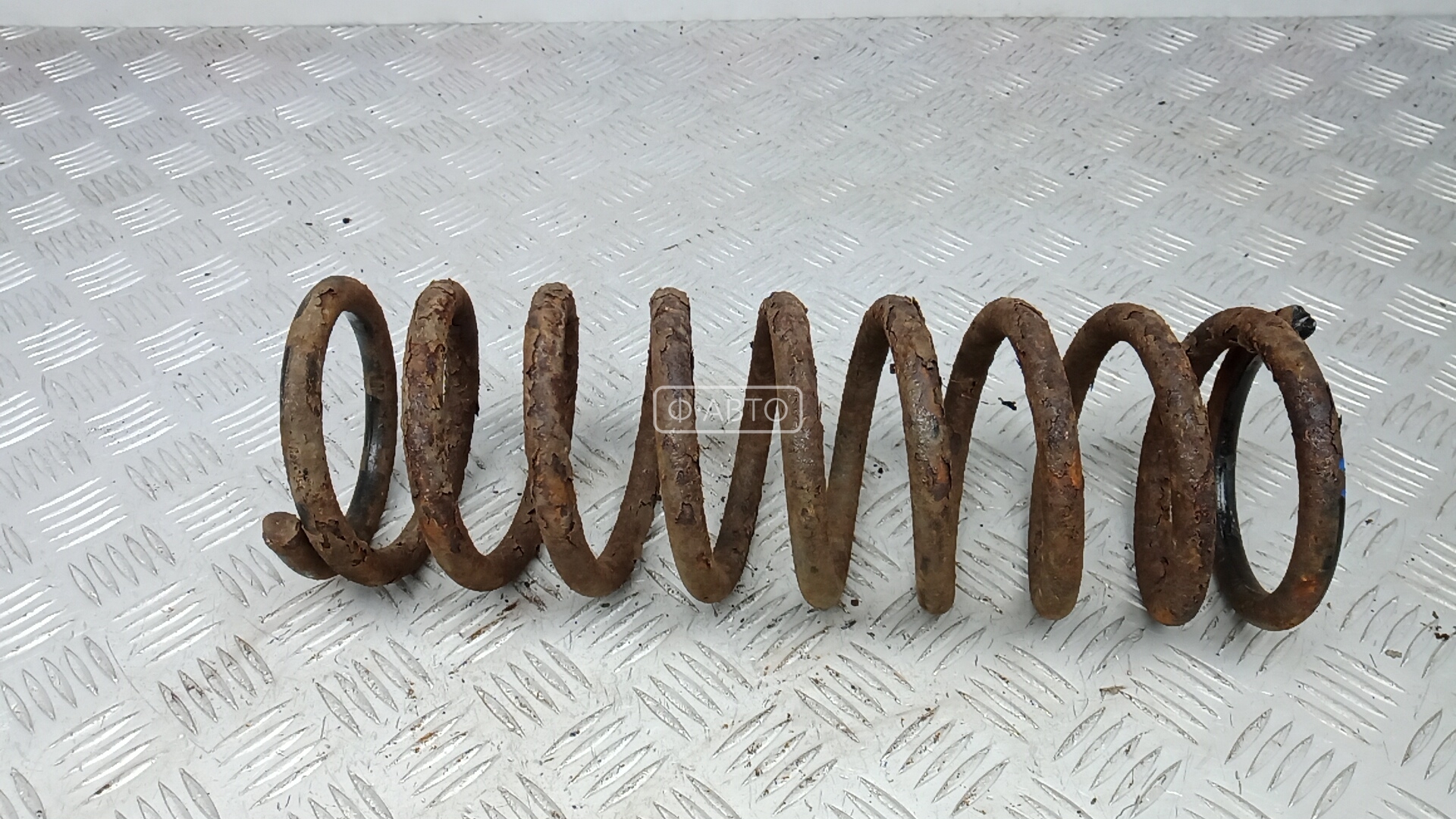 Пружина задняя