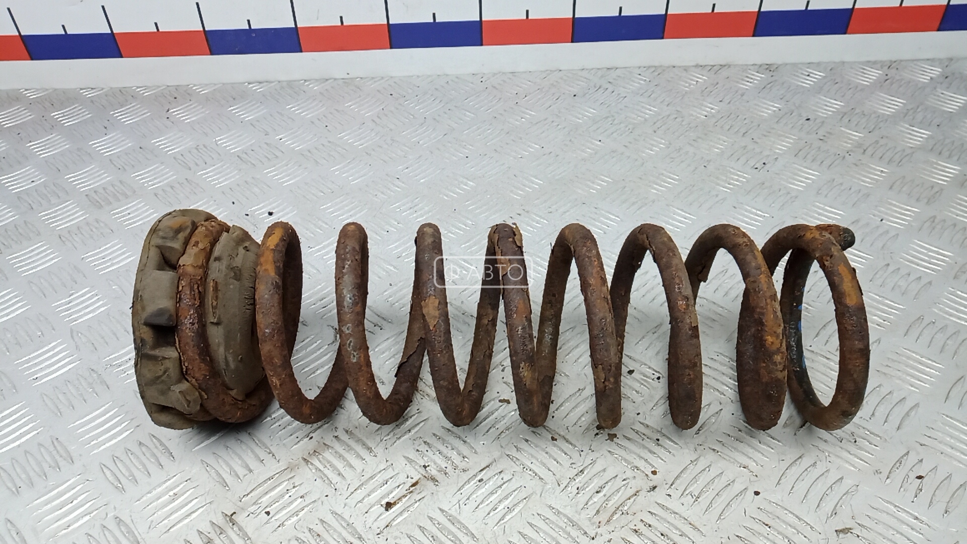 Пружина задняя