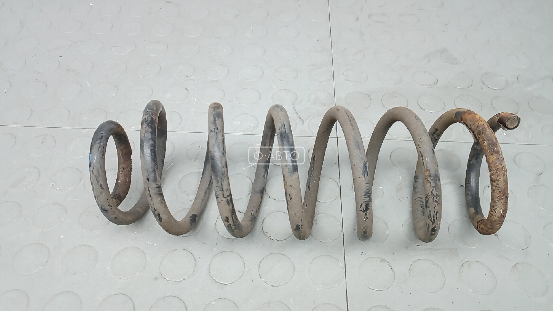 Пружина задняя