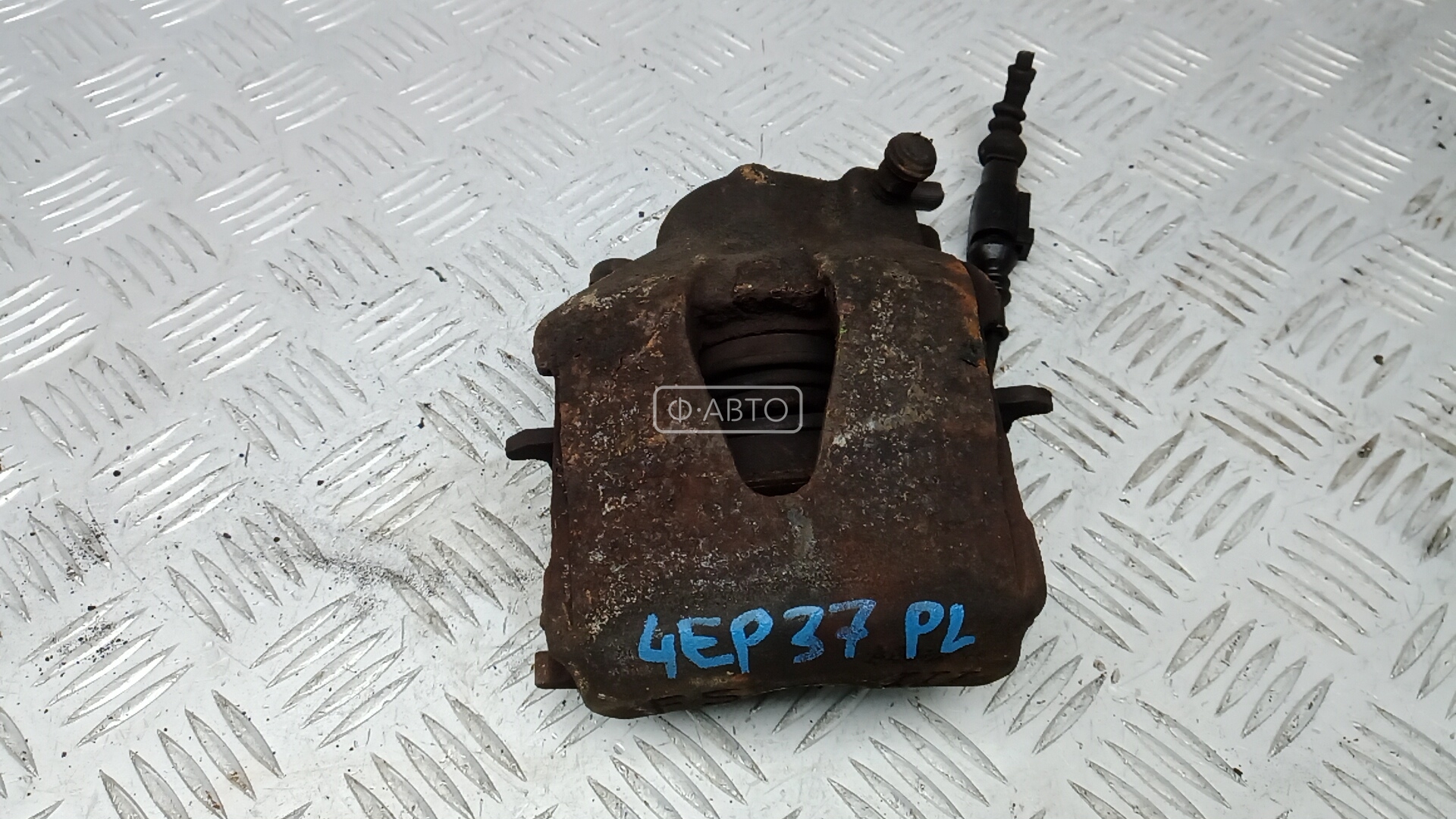 Суппорт тормозной передний левый