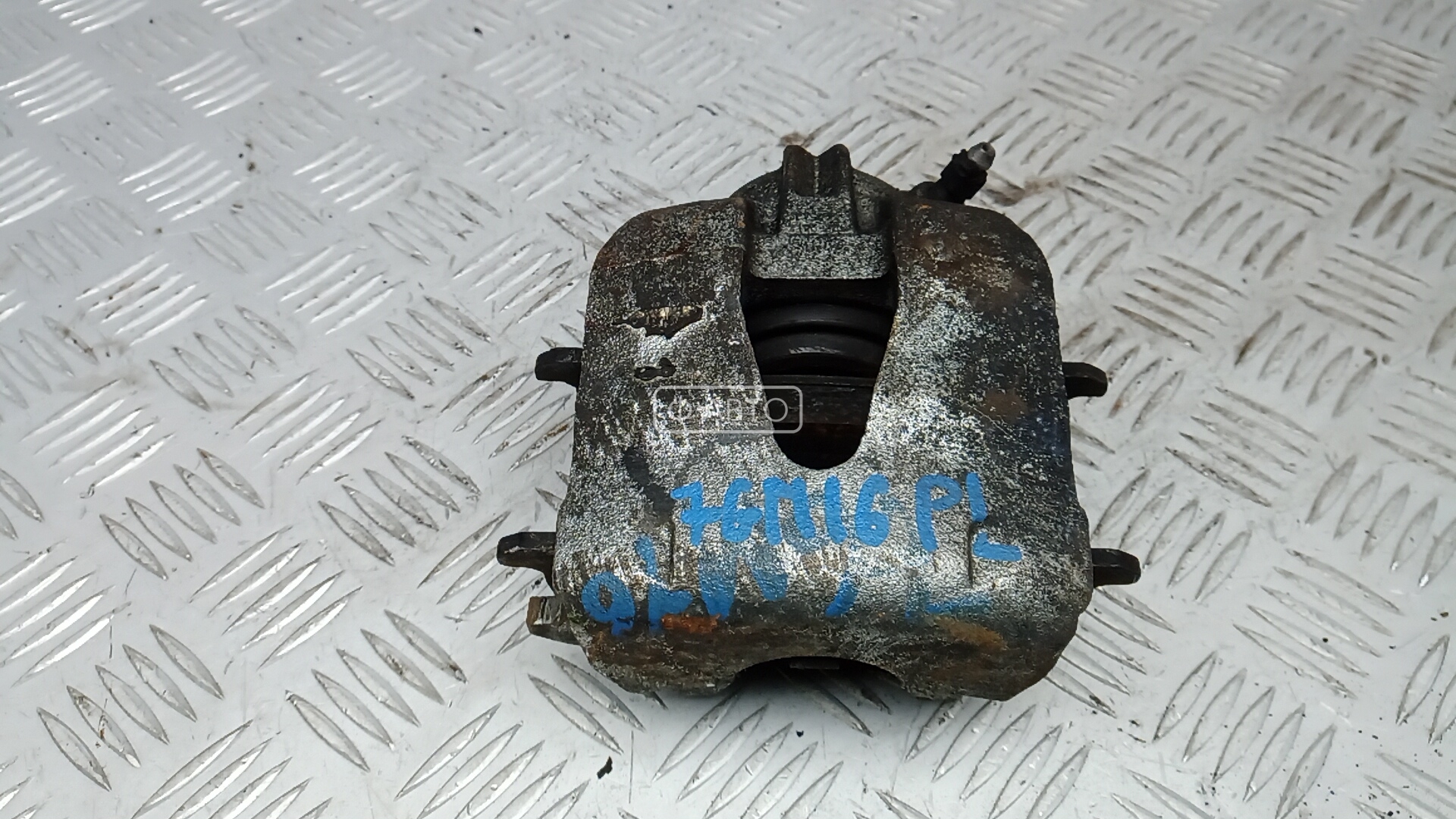 Суппорт тормозной передний левый