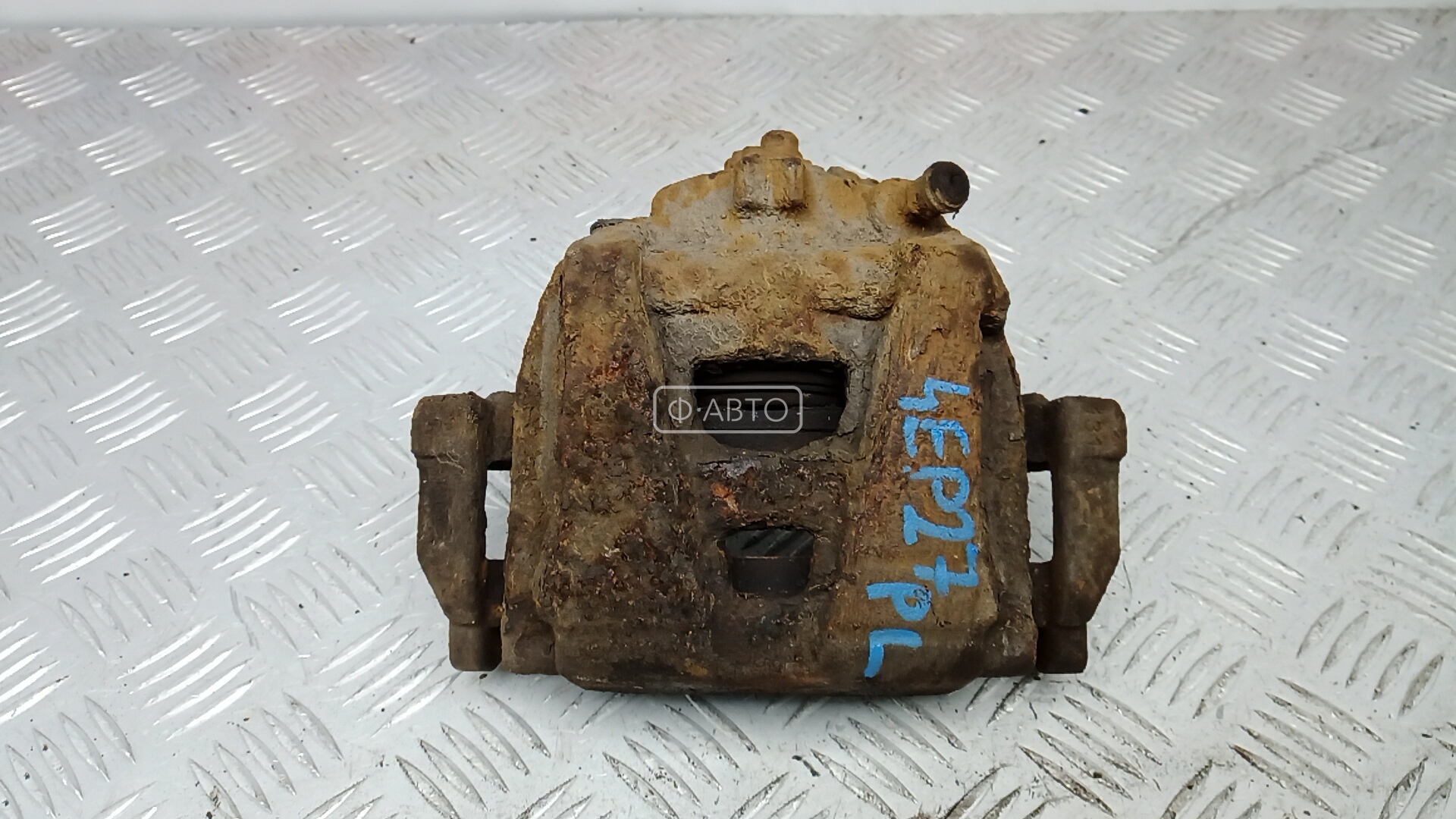 Суппорт тормозной передний левый