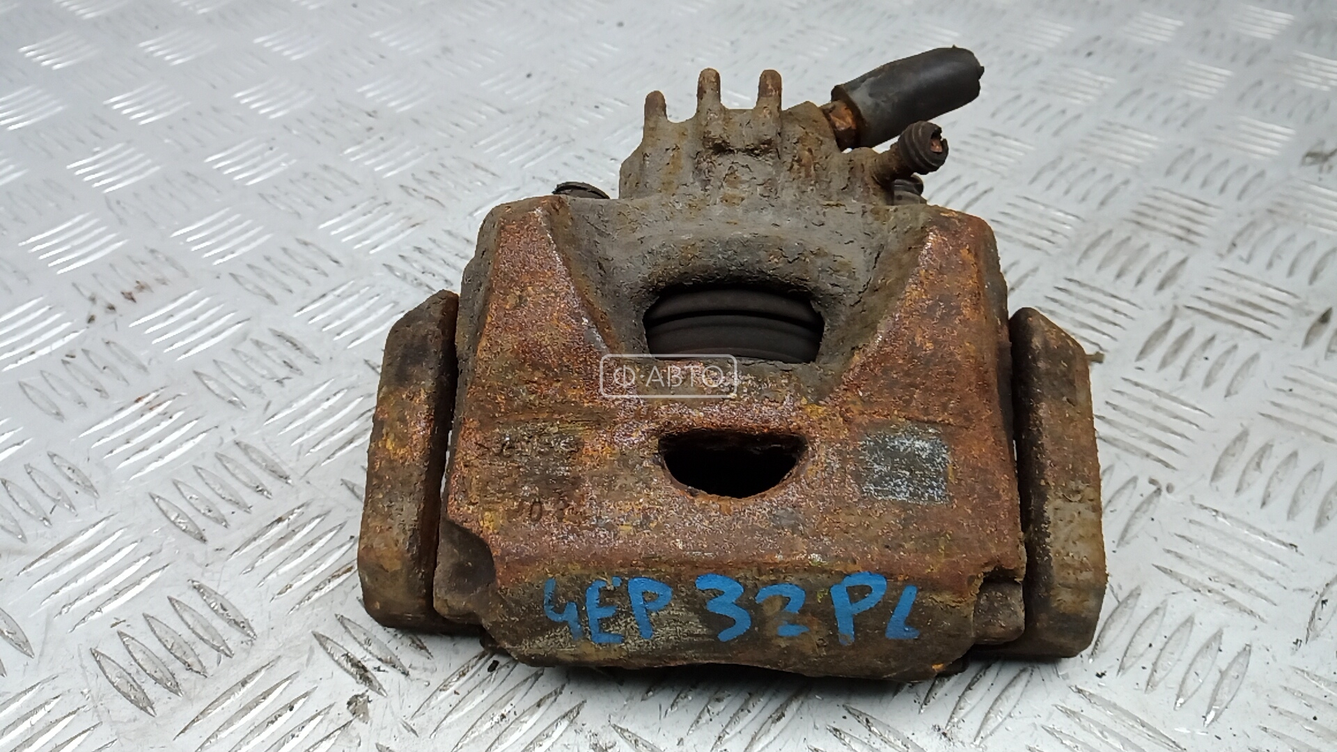 Суппорт тормозной передний левый