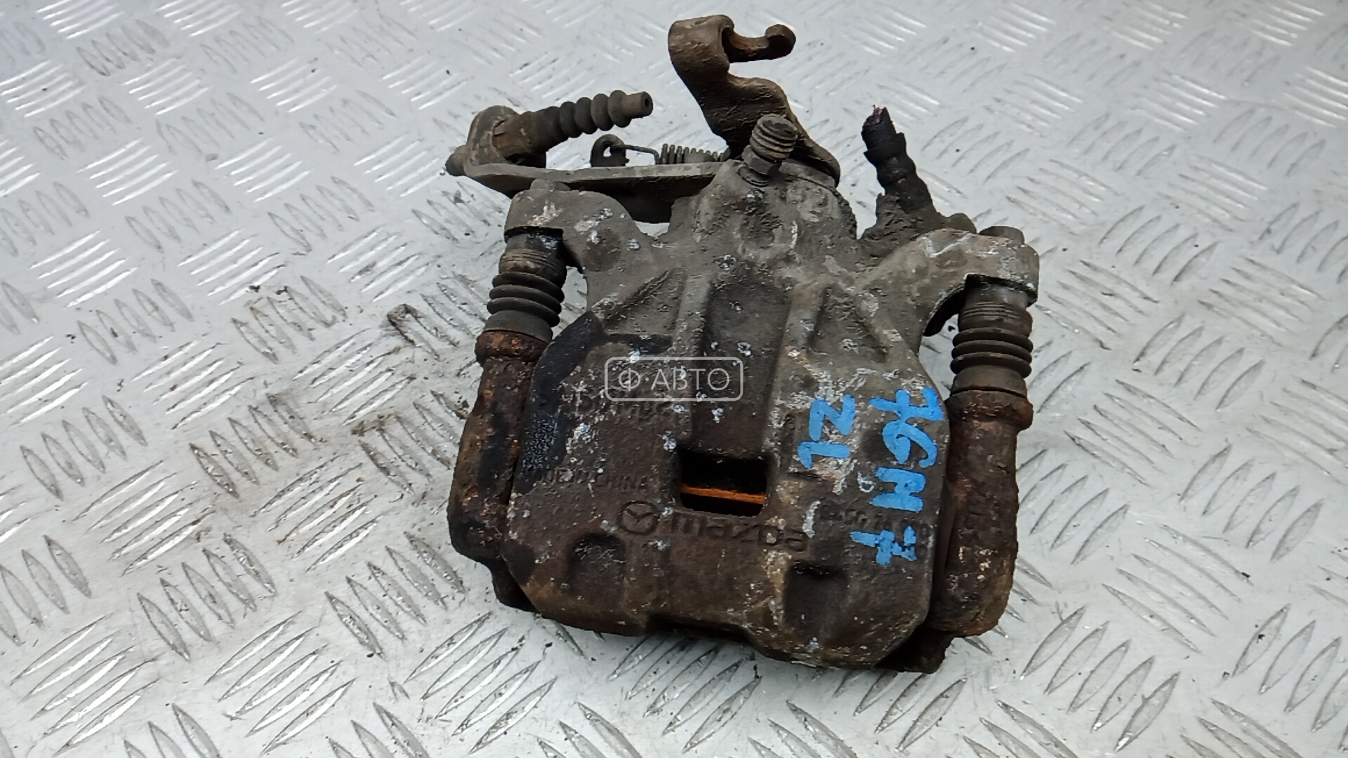 Суппорт тормозной задний левый