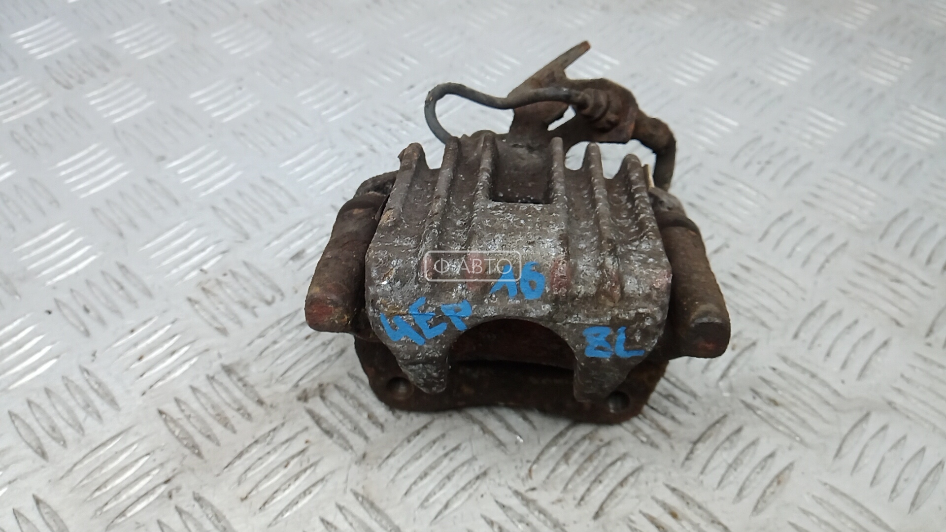 Суппорт тормозной задний левый