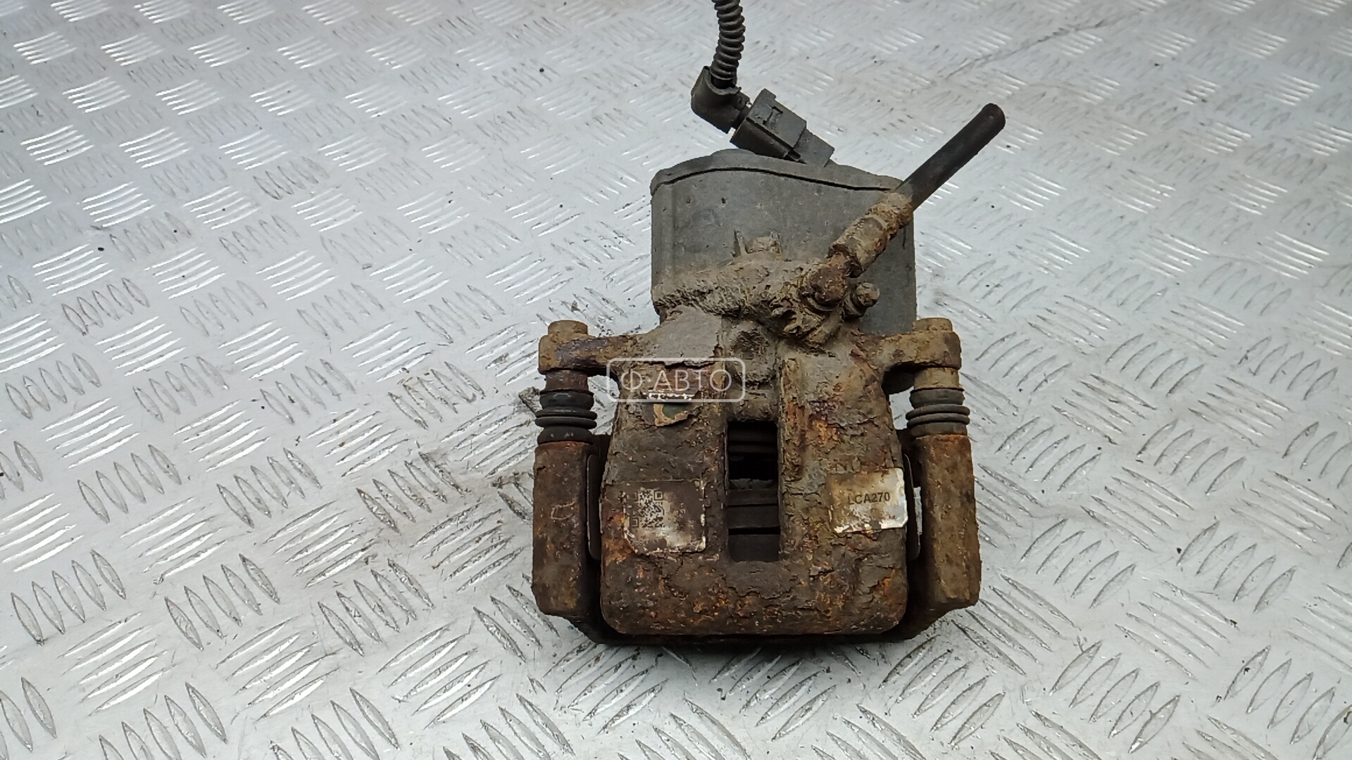 Суппорт тормозной задний левый