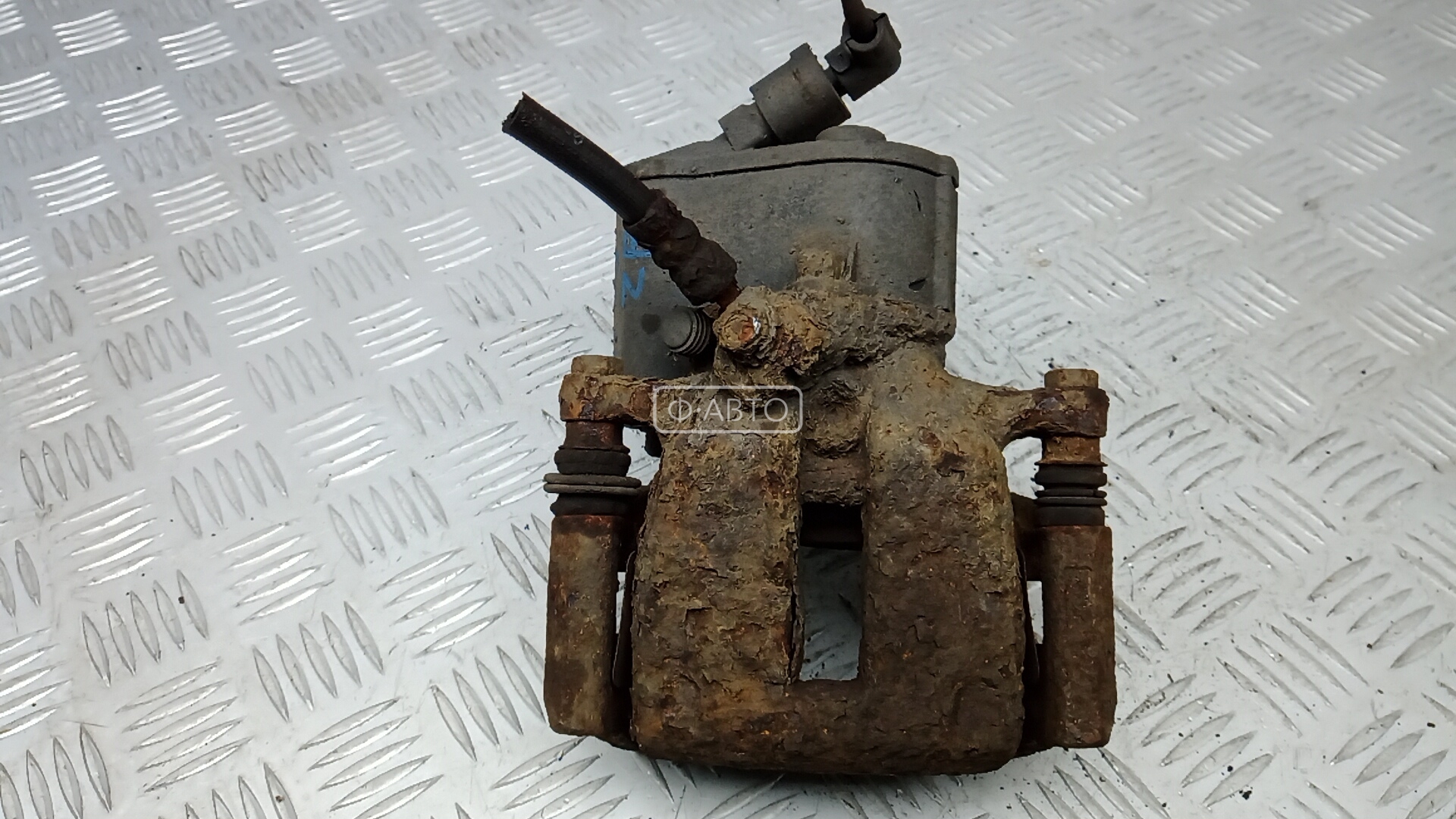 Суппорт тормозной задний правый