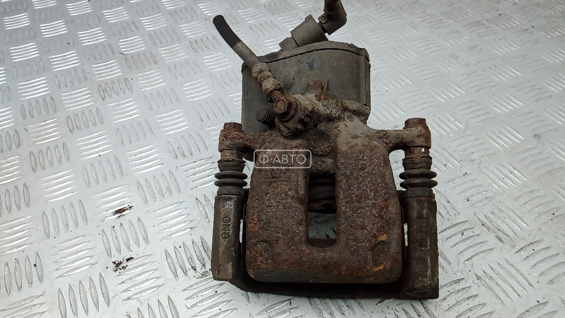 Суппорт тормозной задний правый