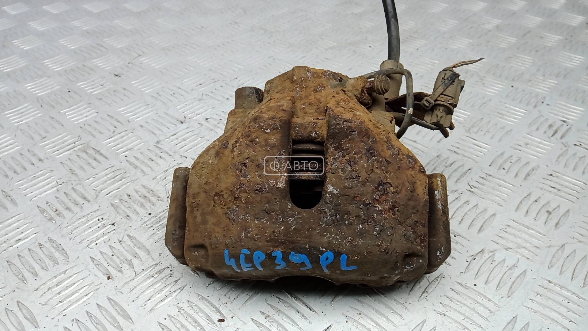 Суппорт тормозной передний левый