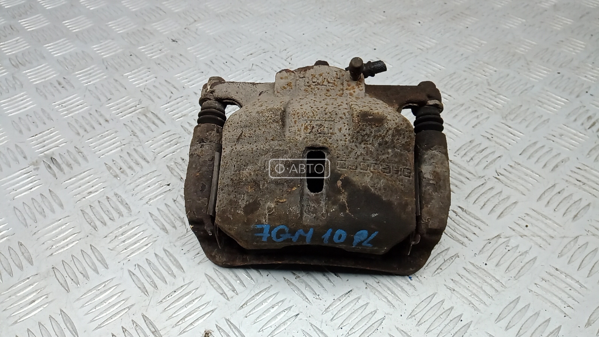 Суппорт тормозной передний левый