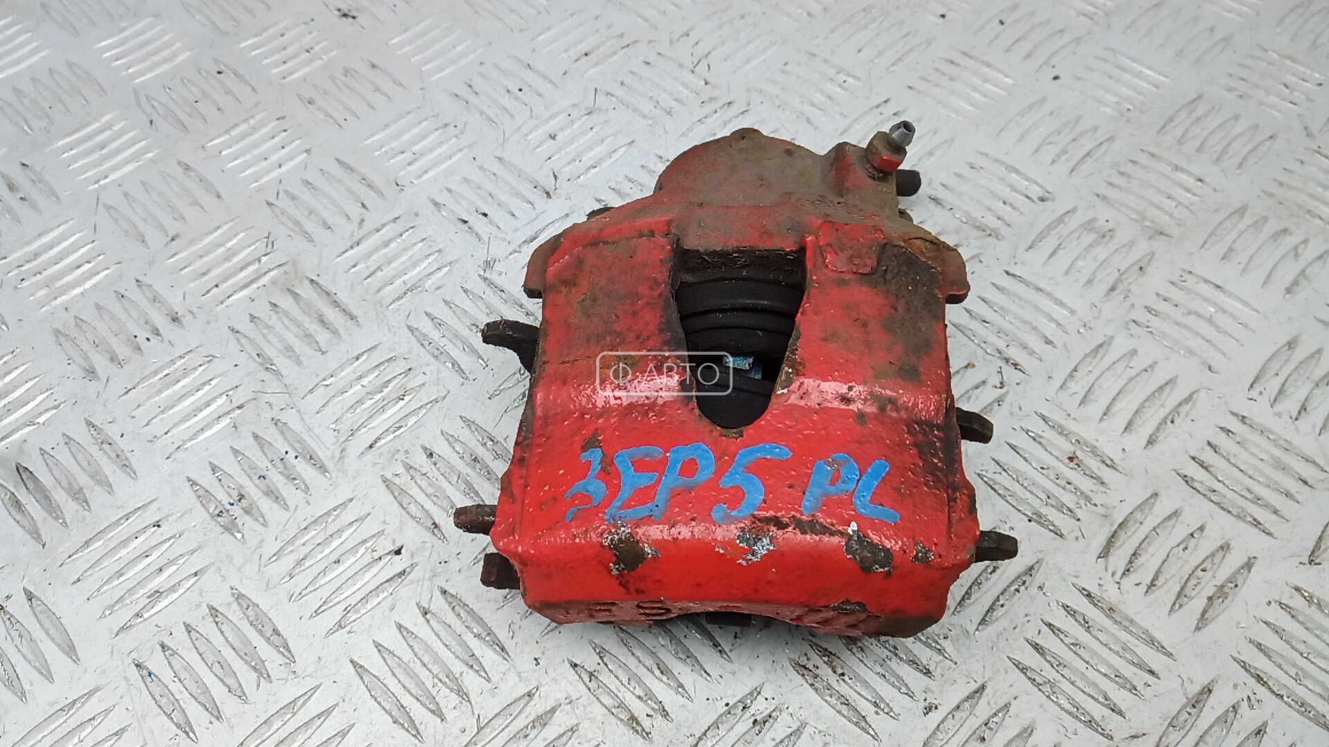 Суппорт тормозной передний левый