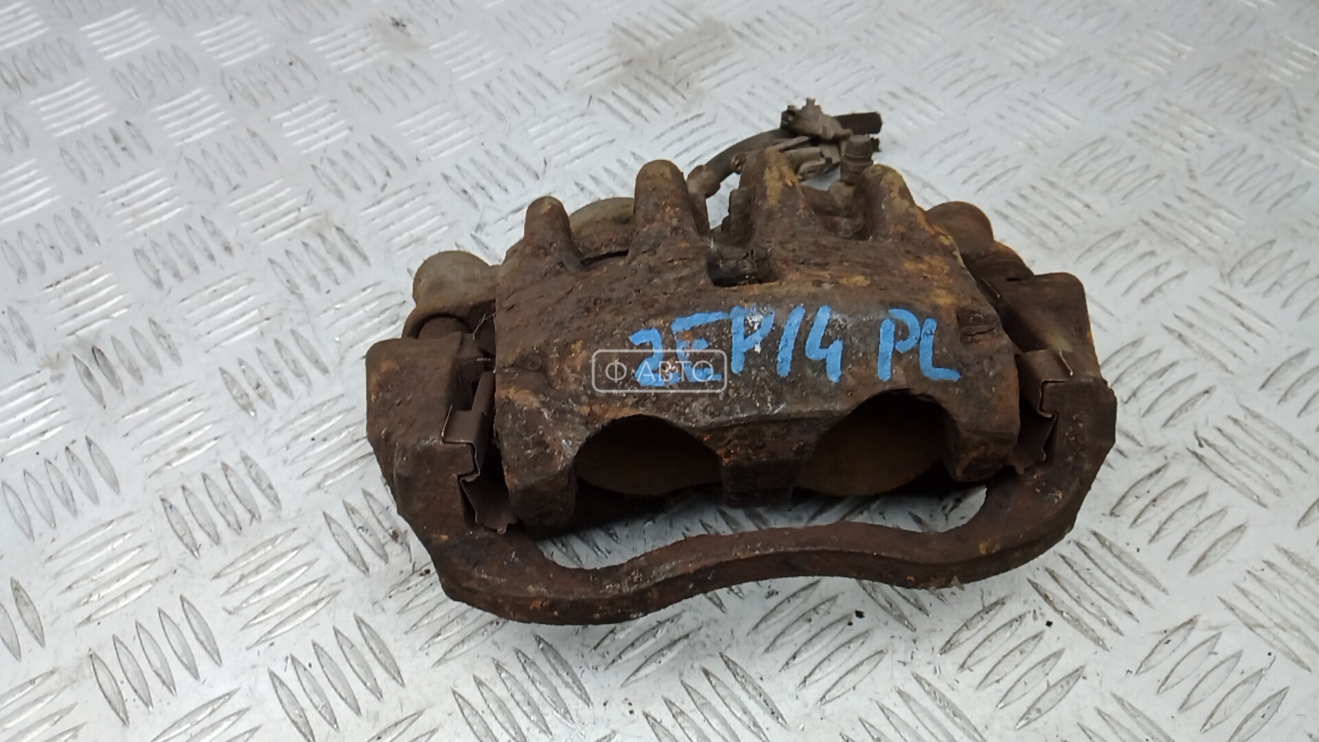 Суппорт тормозной передний левый