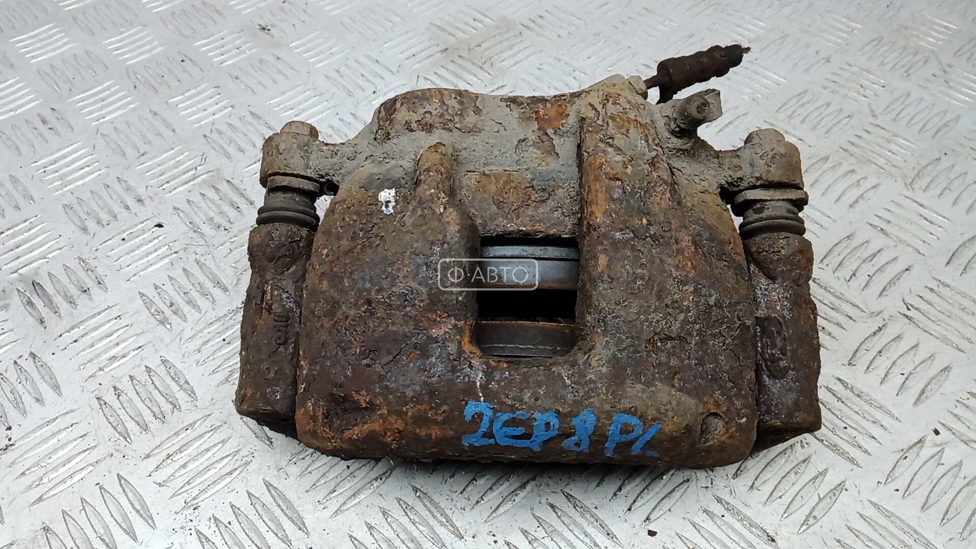 Суппорт тормозной передний левый