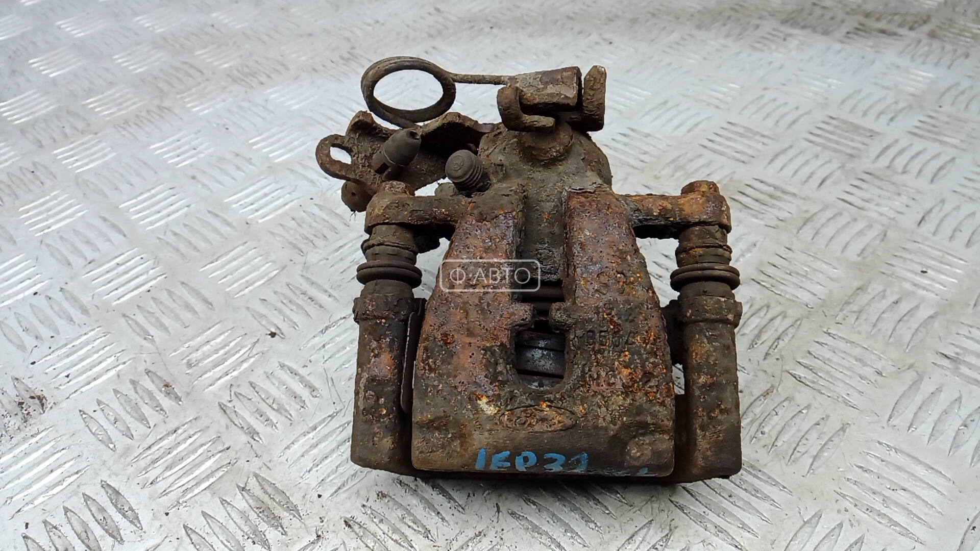 Суппорт тормозной задний левый