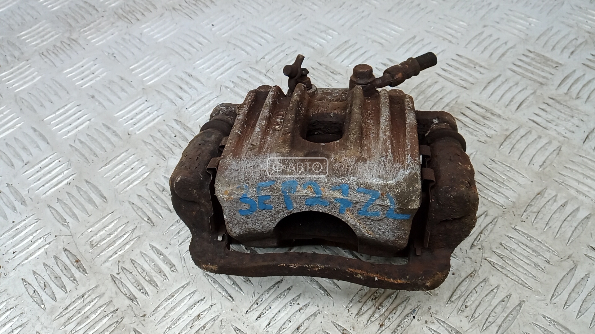 Суппорт тормозной задний левый