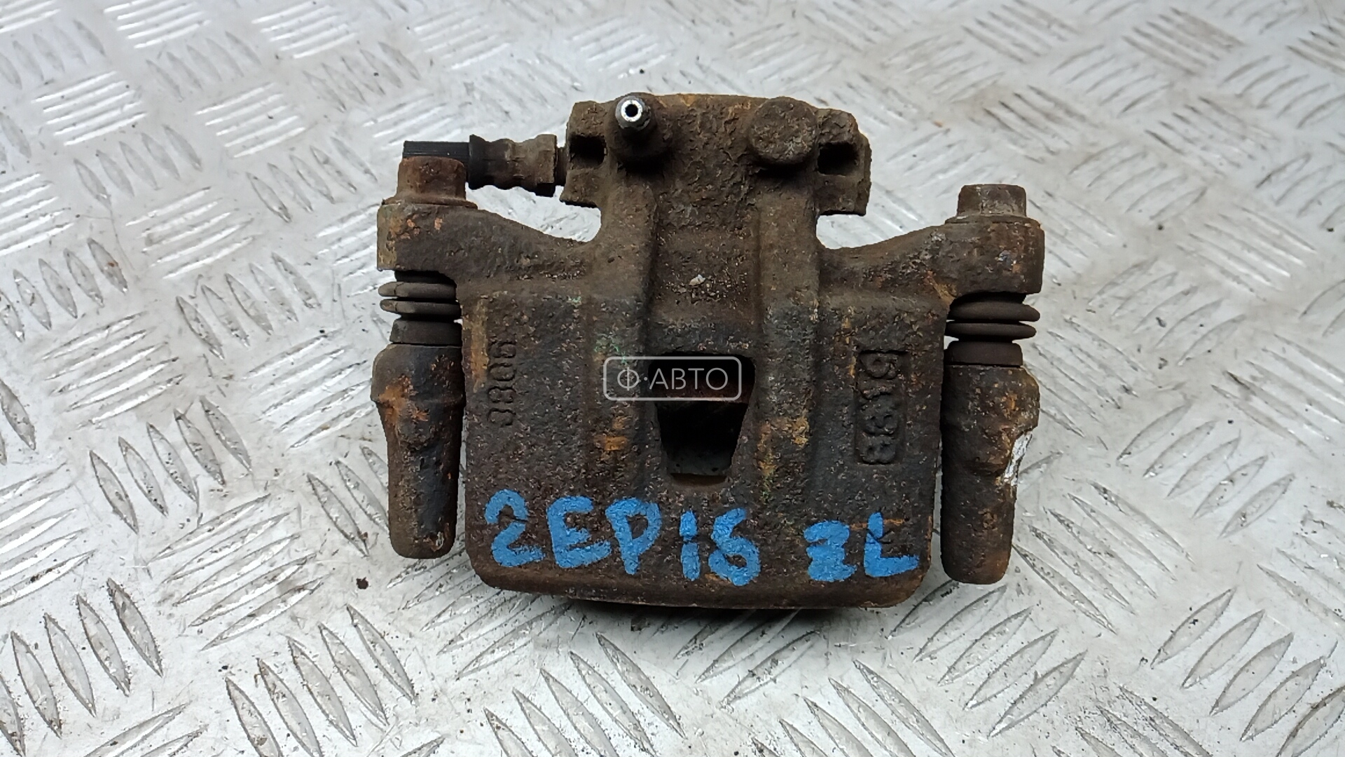 Суппорт тормозной задний левый