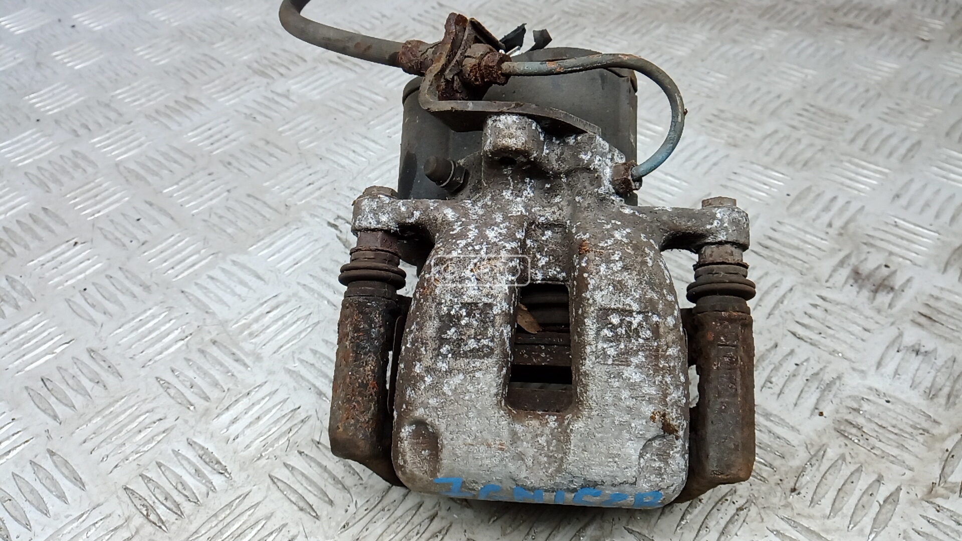 Суппорт тормозной задний правый