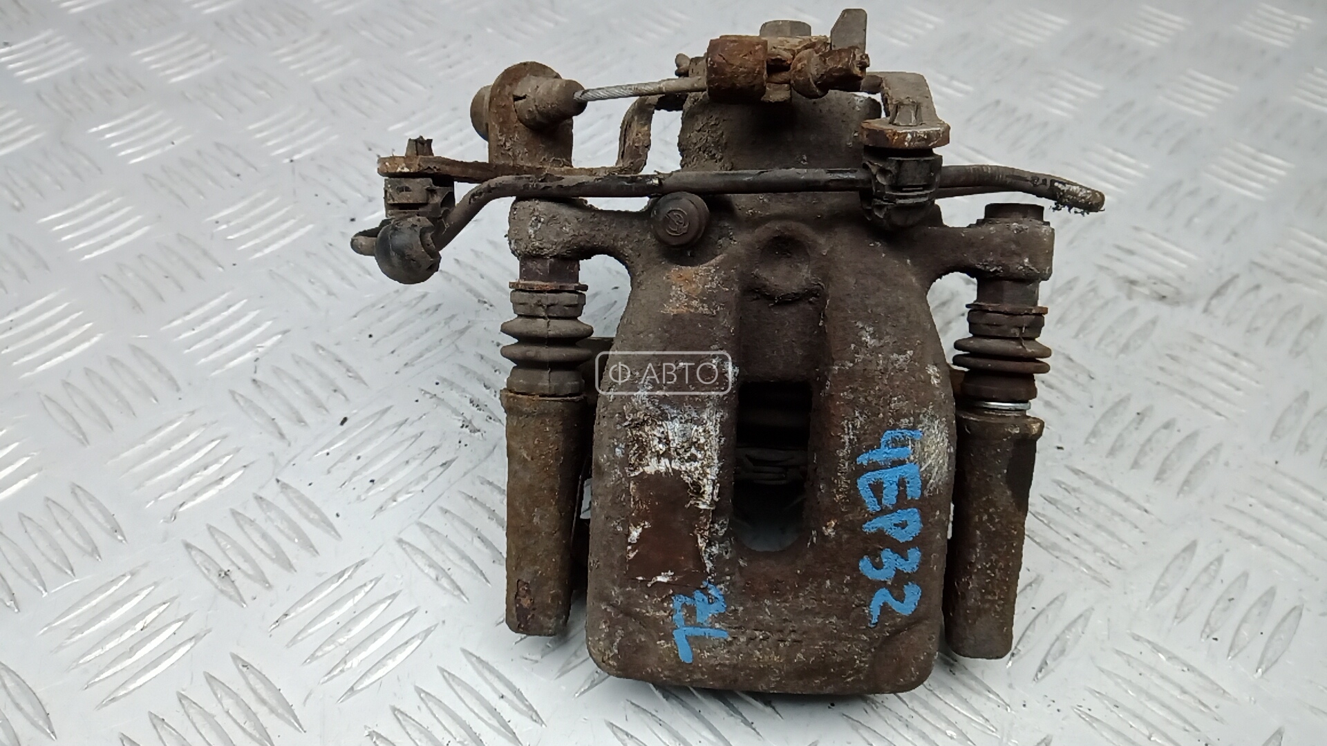 Суппорт тормозной задний левый