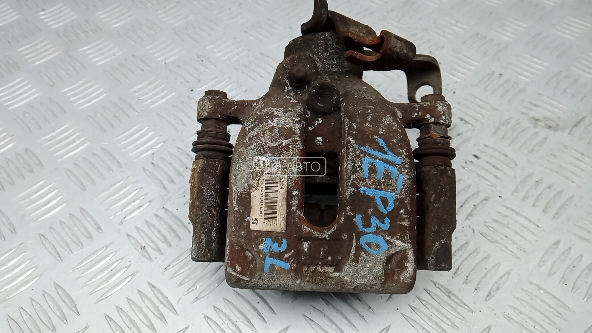 Суппорт тормозной задний левый