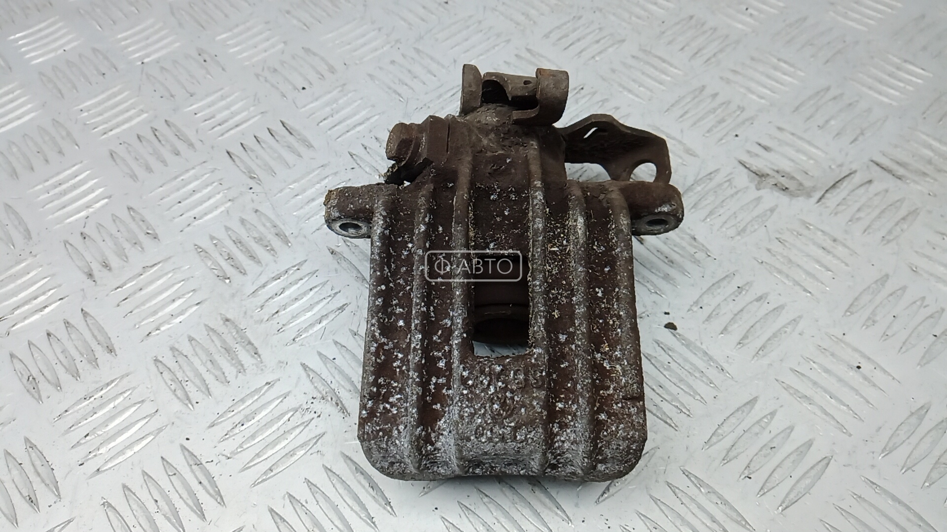 Суппорт тормозной задний левый
