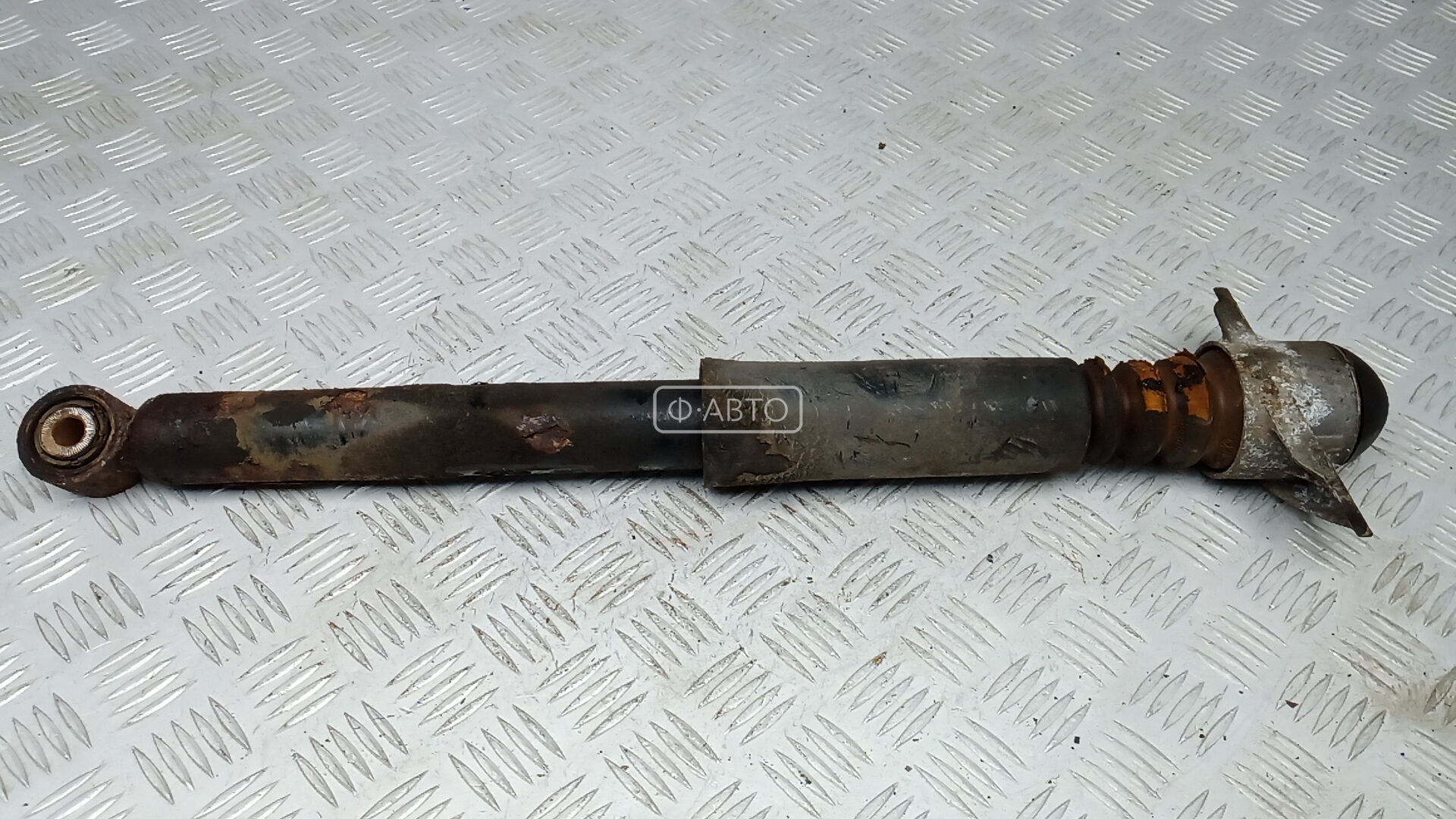 Амортизатор задней балки