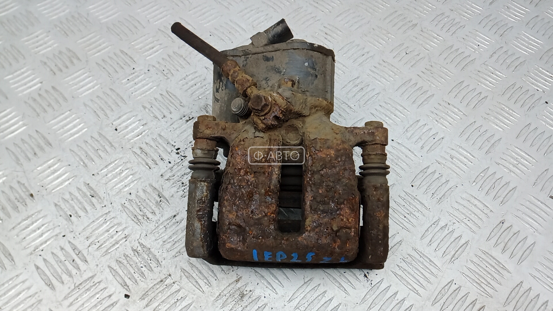 Суппорт тормозной задний левый