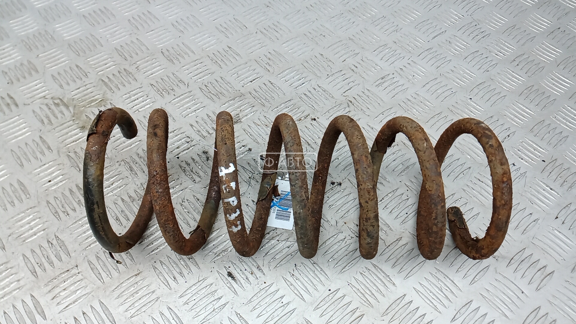 Пружина задняя