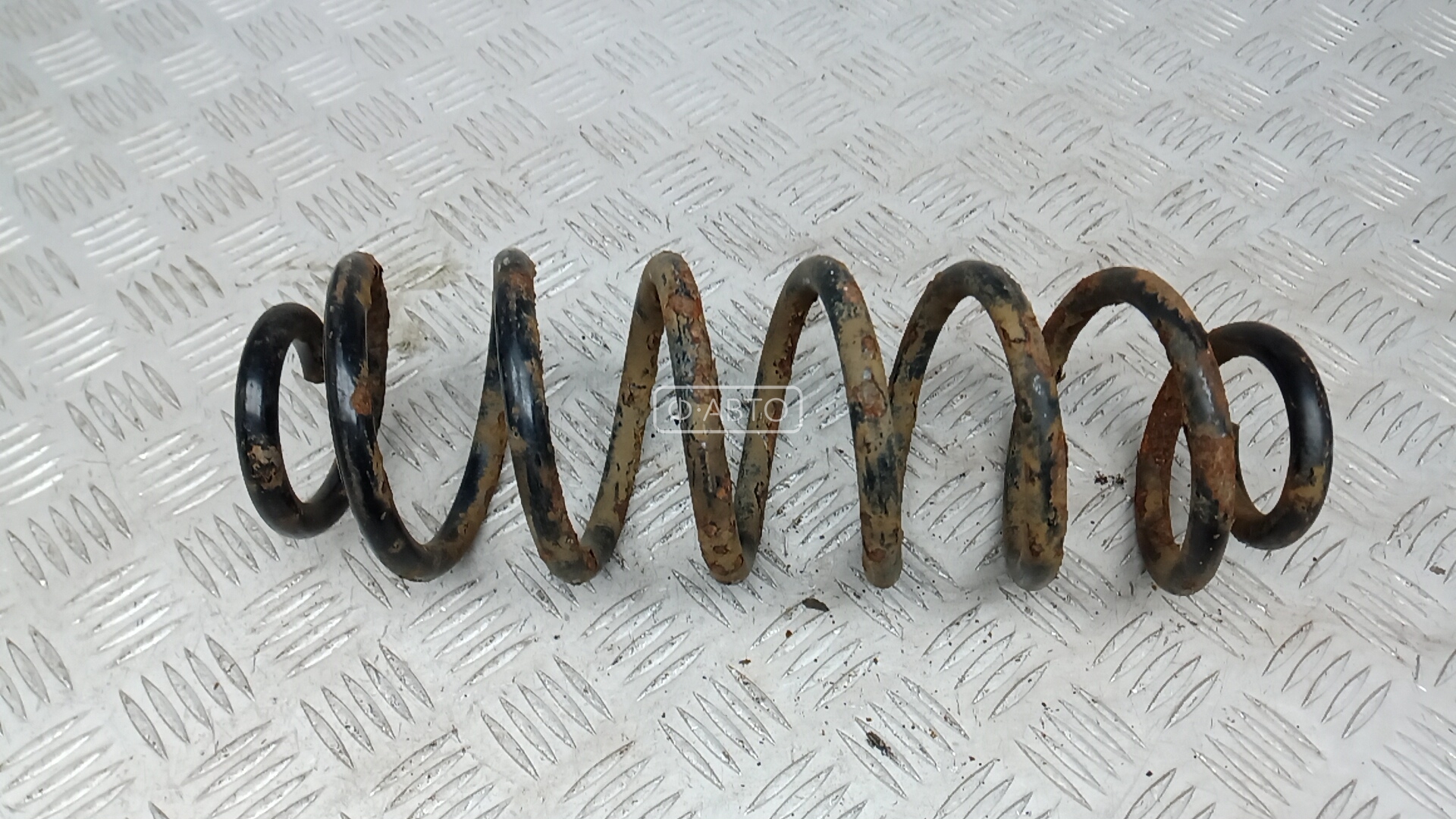 Пружина задняя