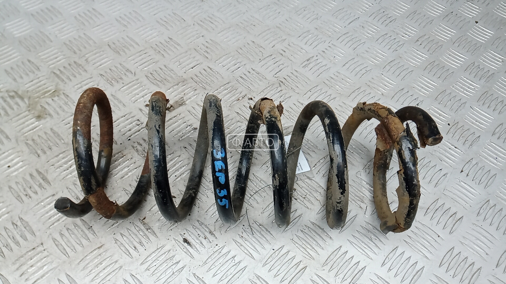 Пружина задняя