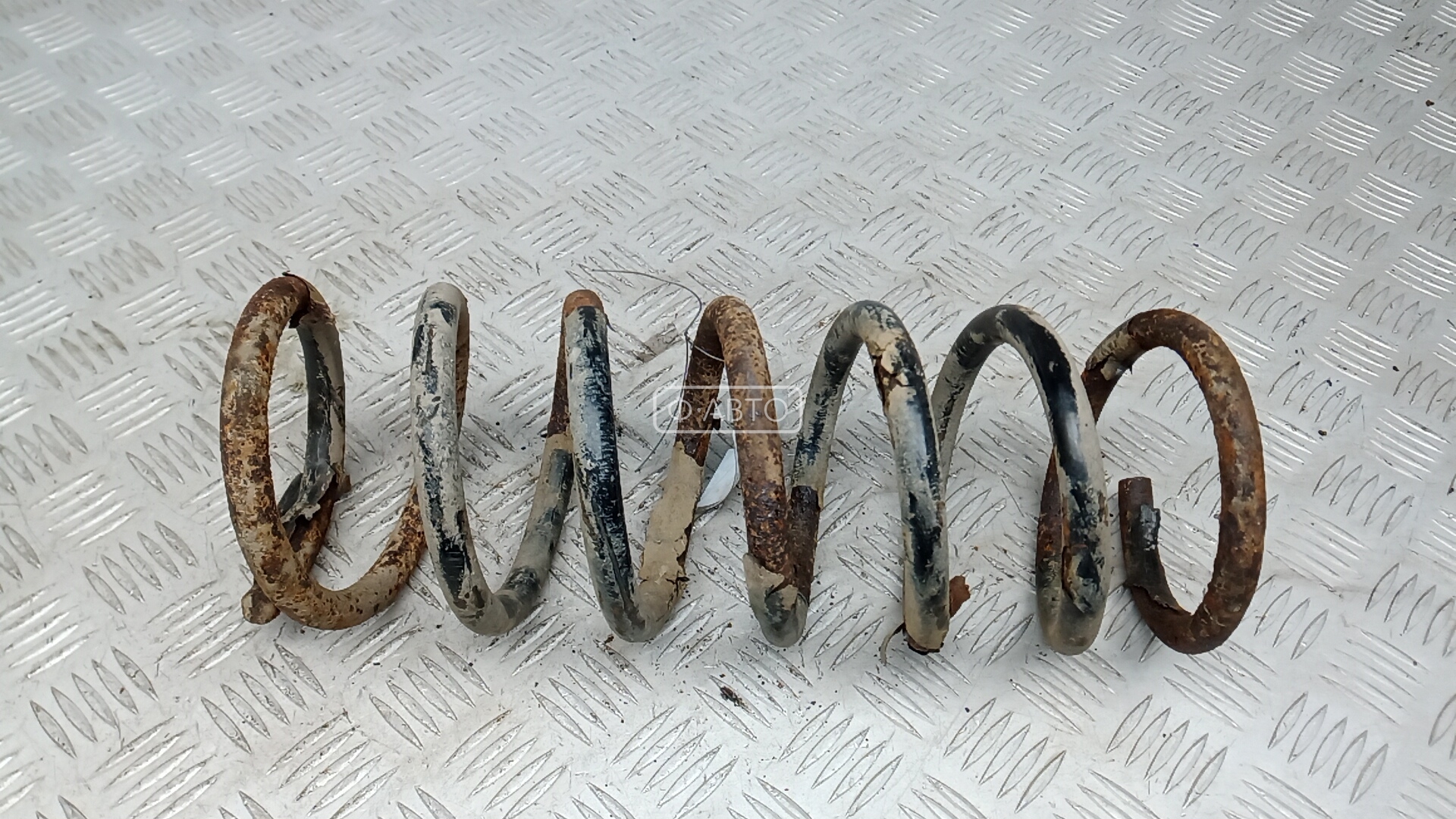 Пружина задняя