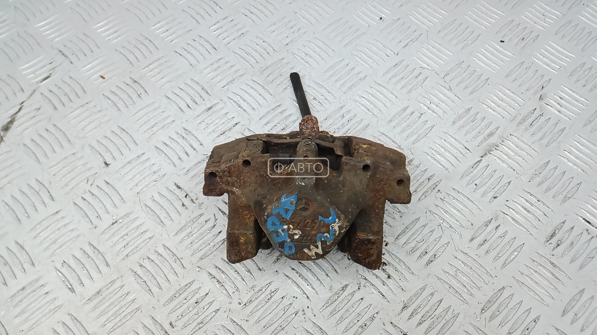 Суппорт тормозной задний левый