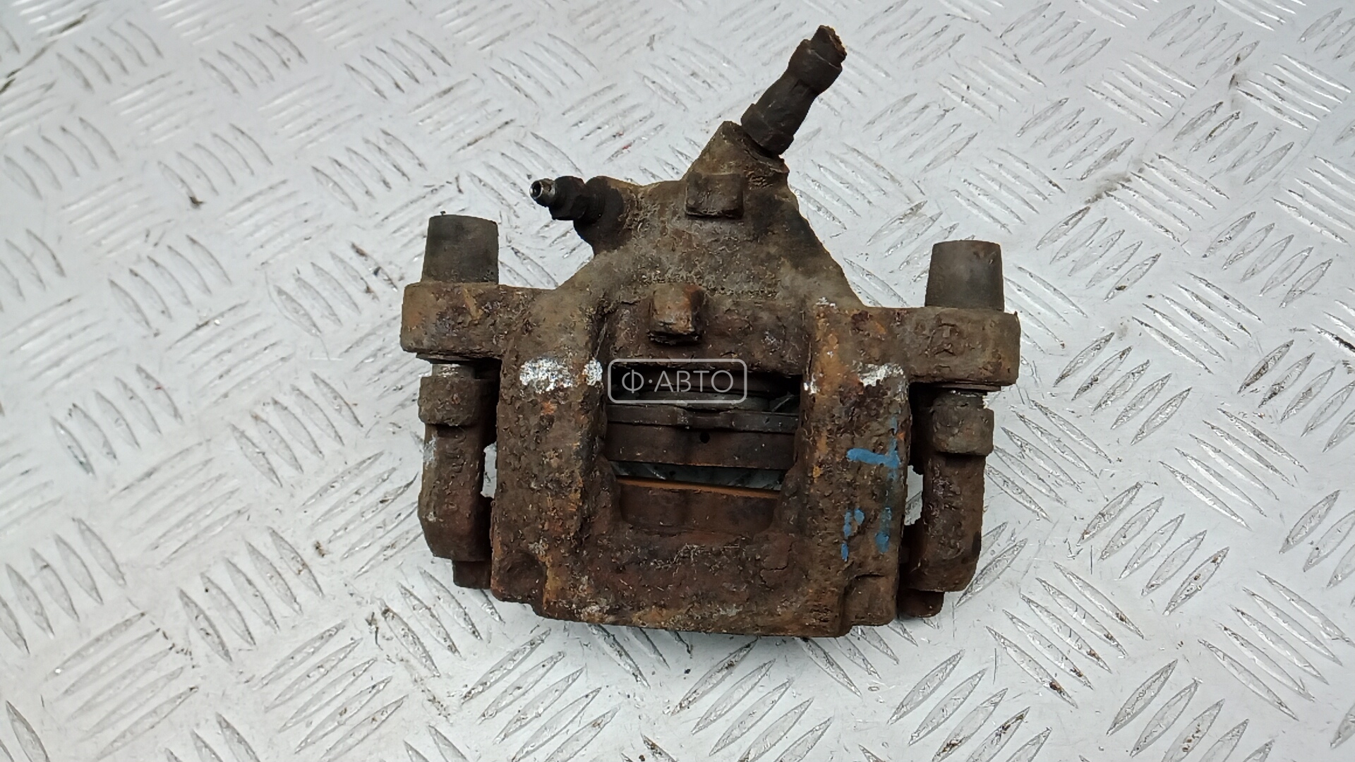 Суппорт тормозной задний левый