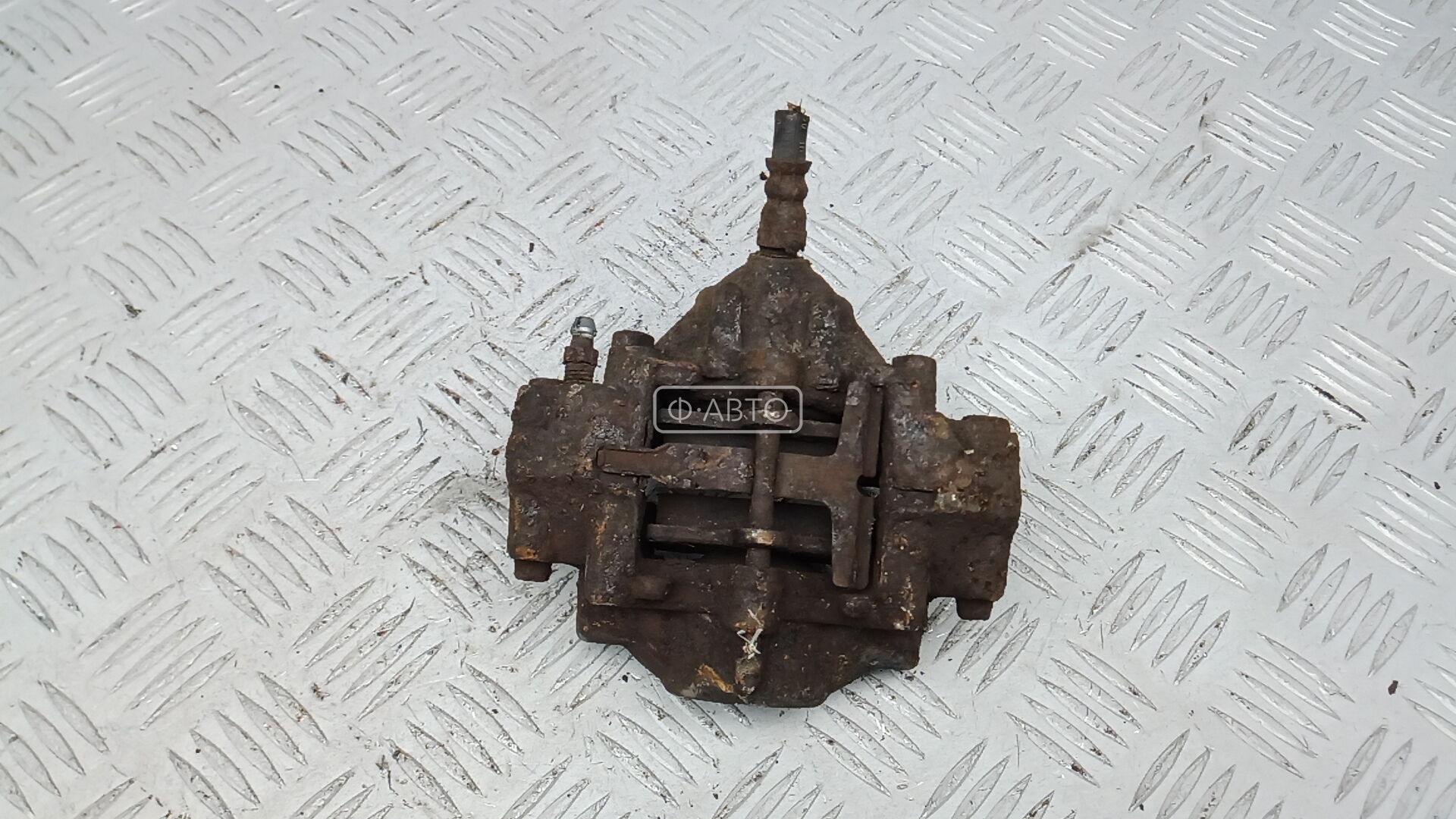 Суппорт тормозной задний левый