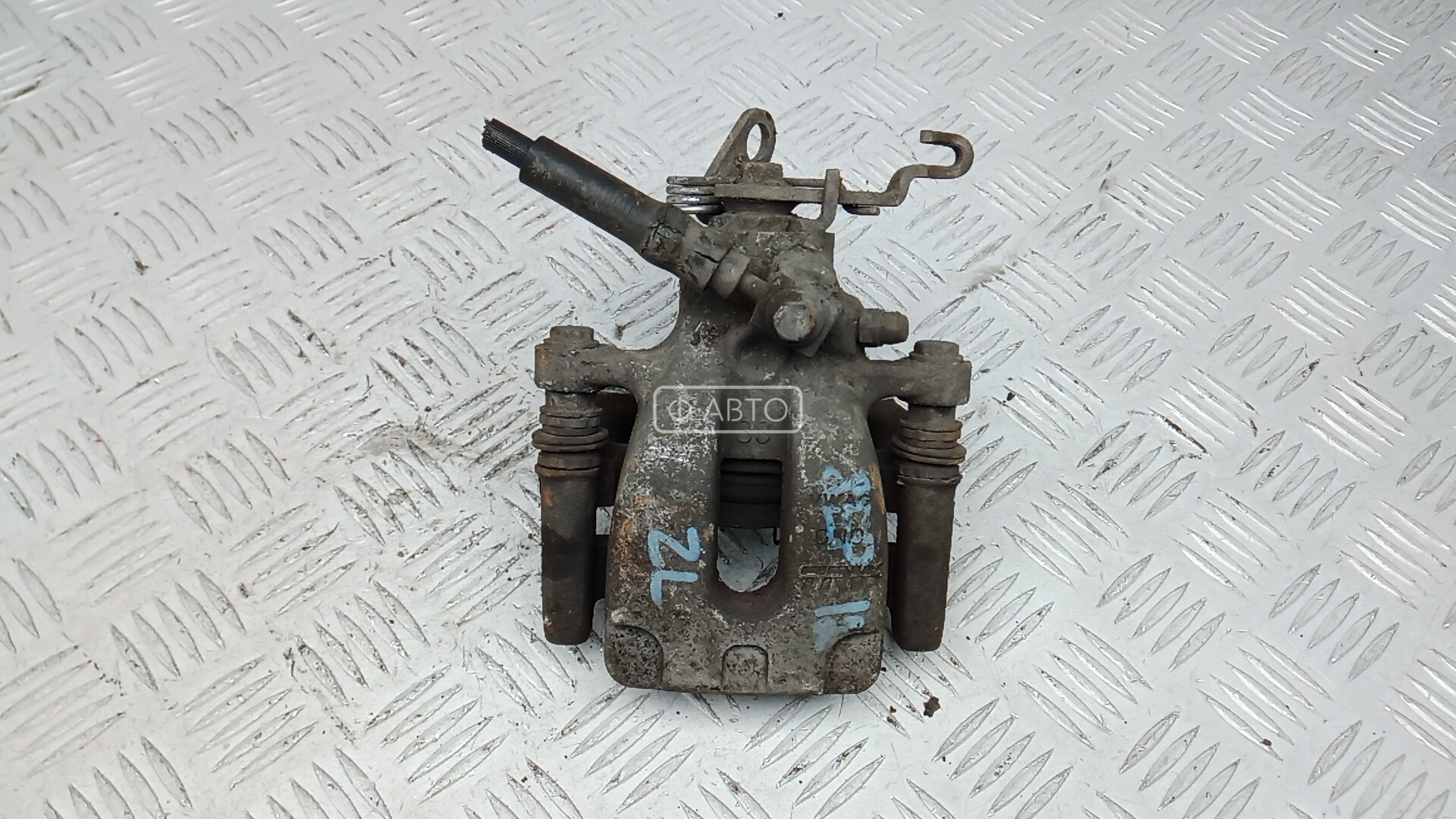 Суппорт тормозной задний левый