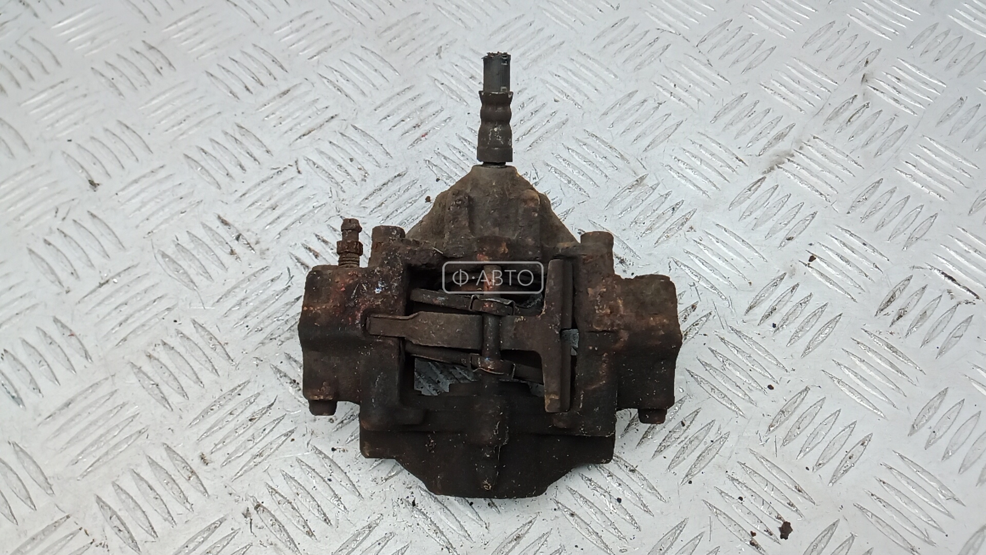 Суппорт тормозной задний левый