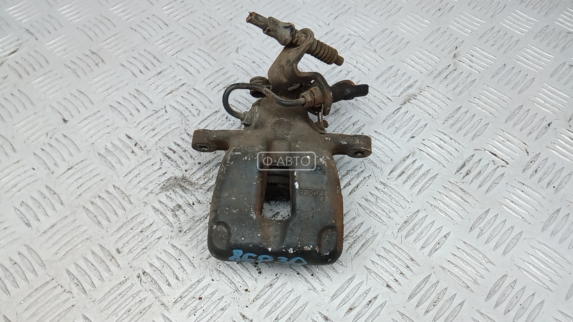 Суппорт тормозной задний левый