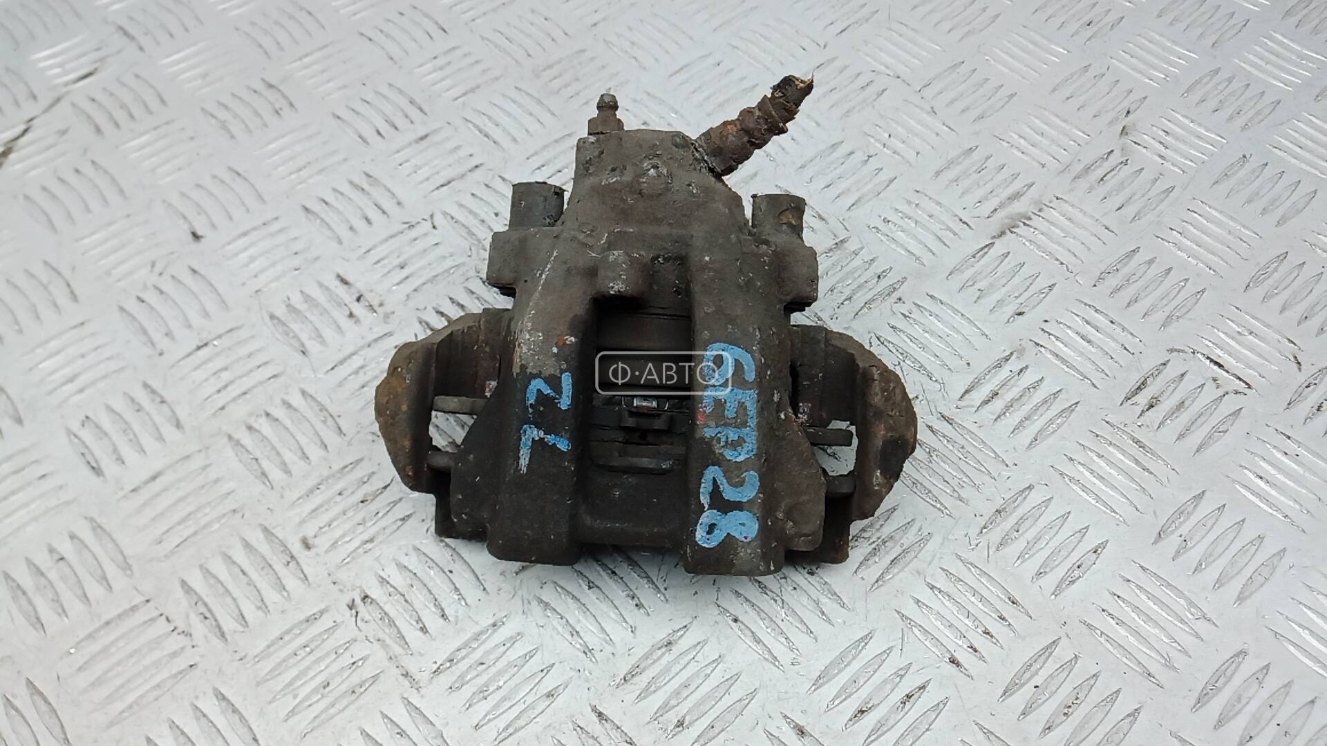 Суппорт тормозной задний левый