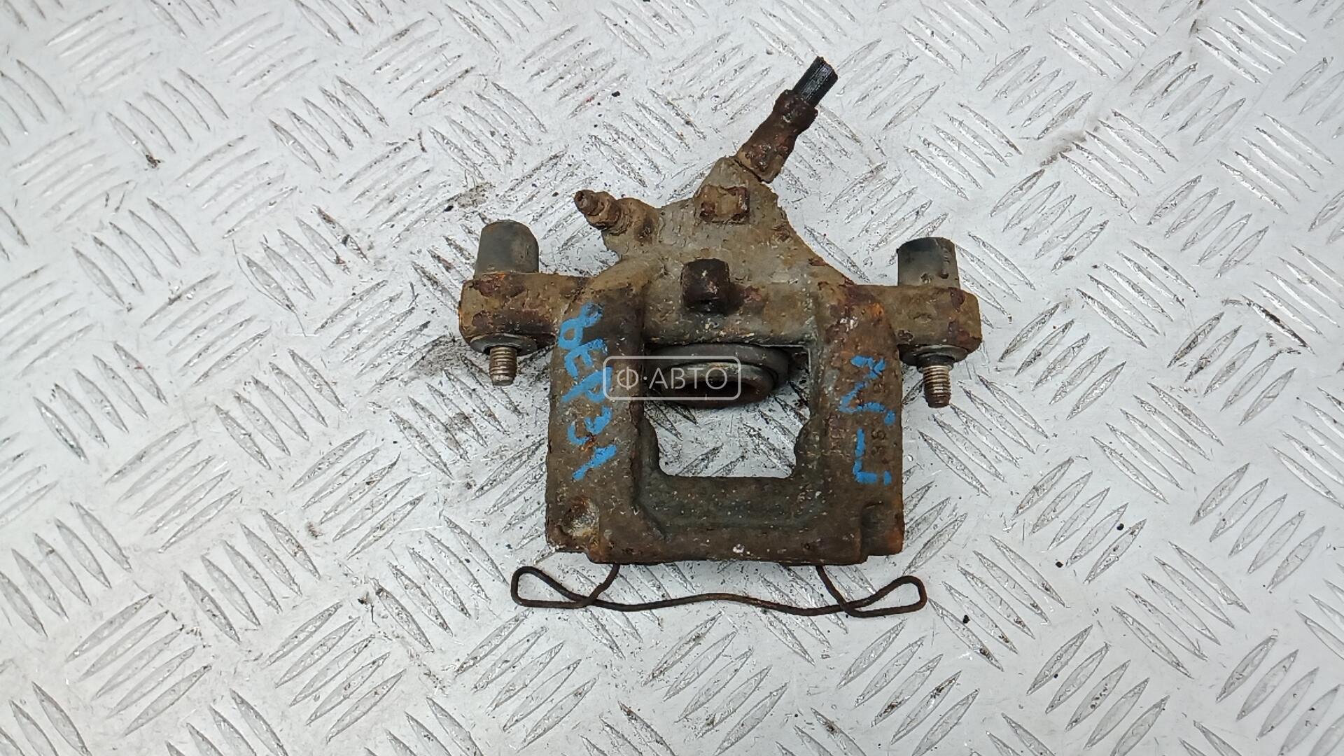 Суппорт тормозной задний левый