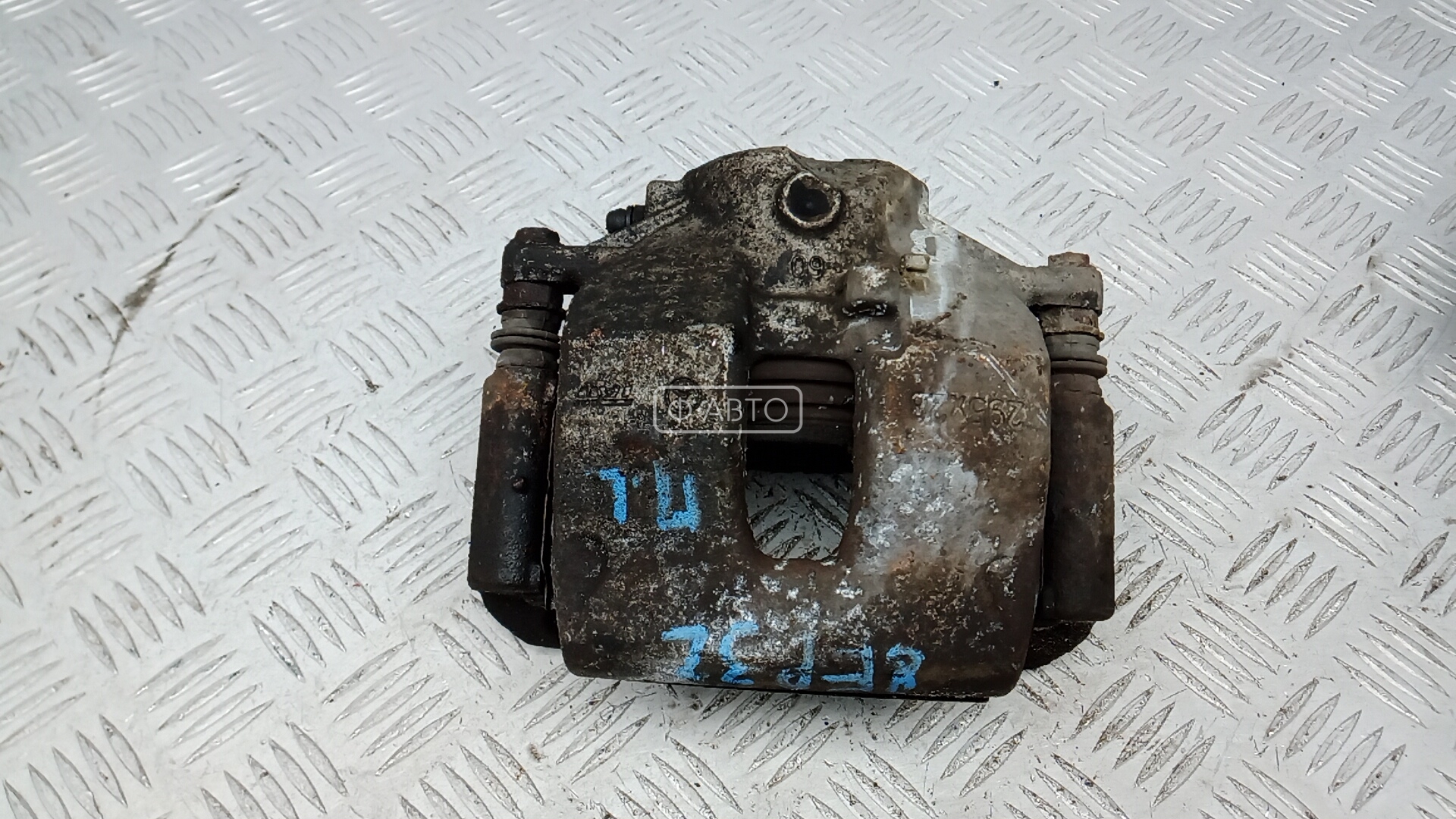 Суппорт тормозной передний левый