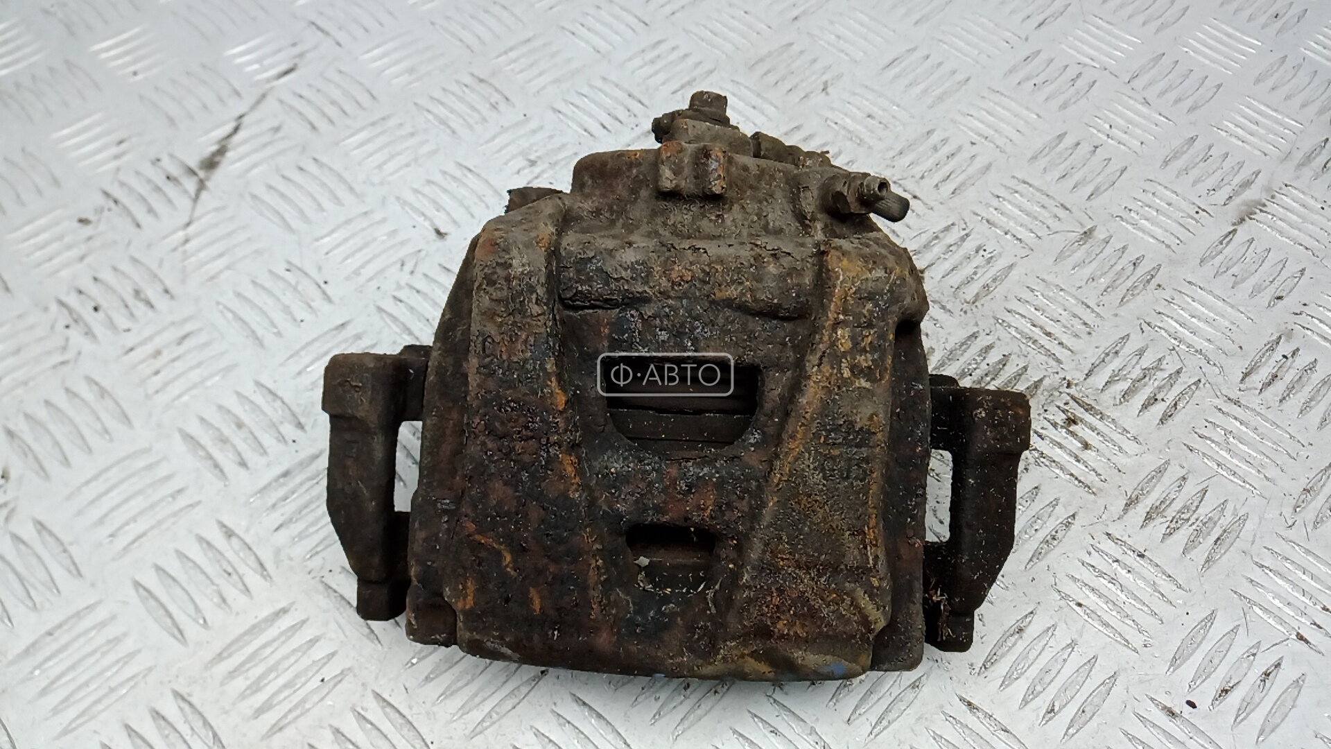 Суппорт тормозной передний левый