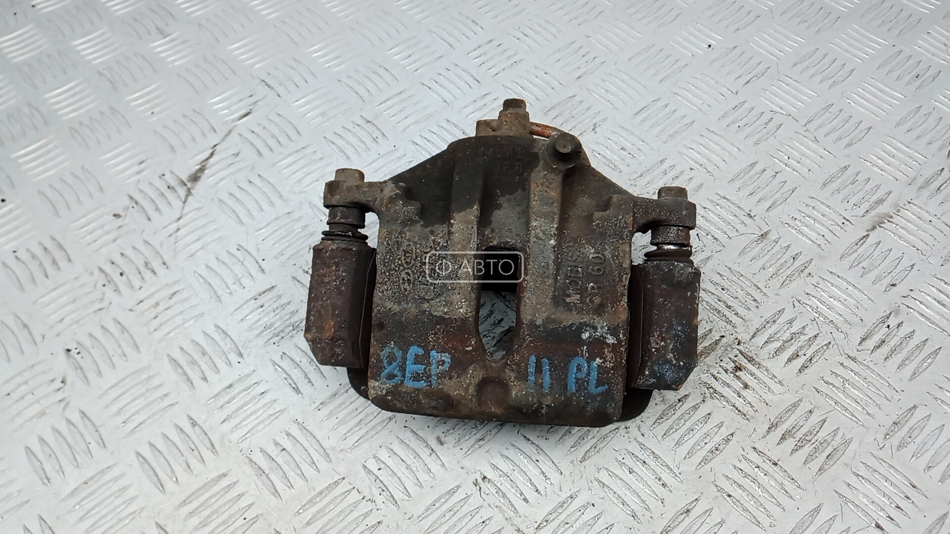 Суппорт тормозной передний левый