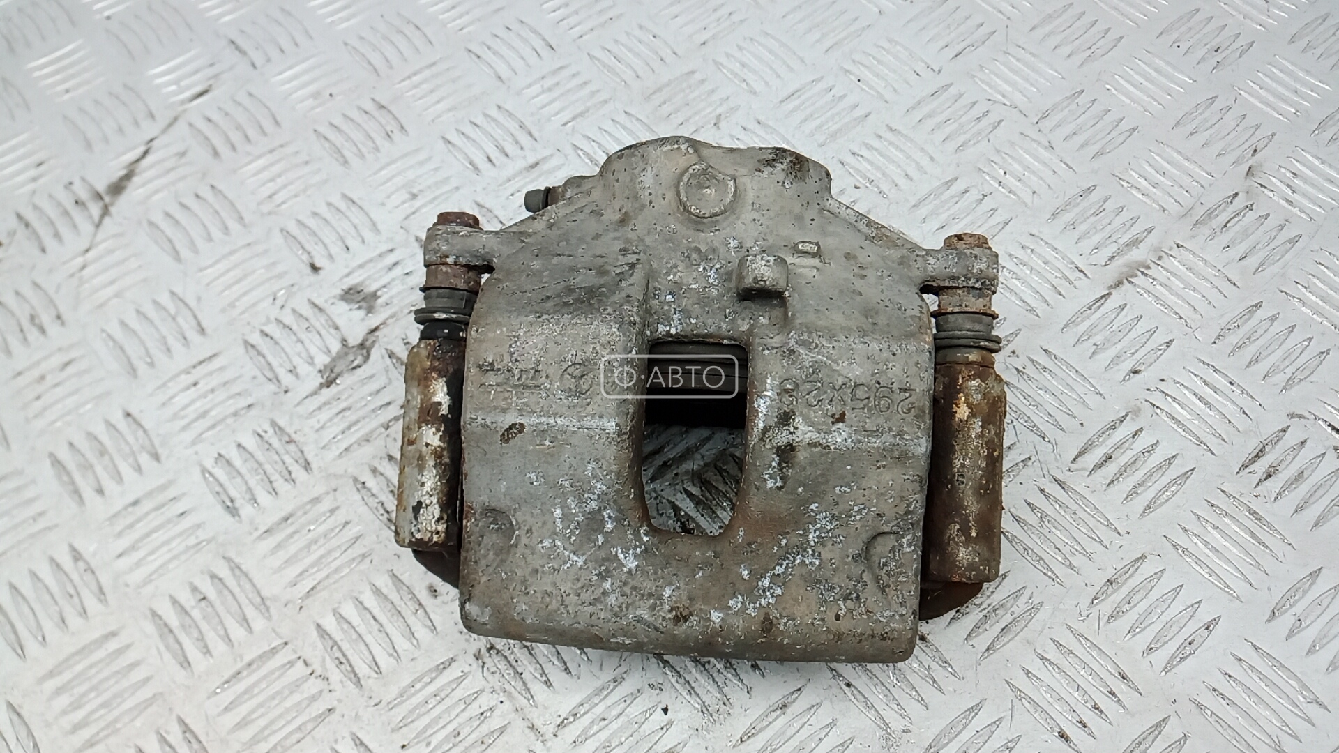 Суппорт тормозной передний левый