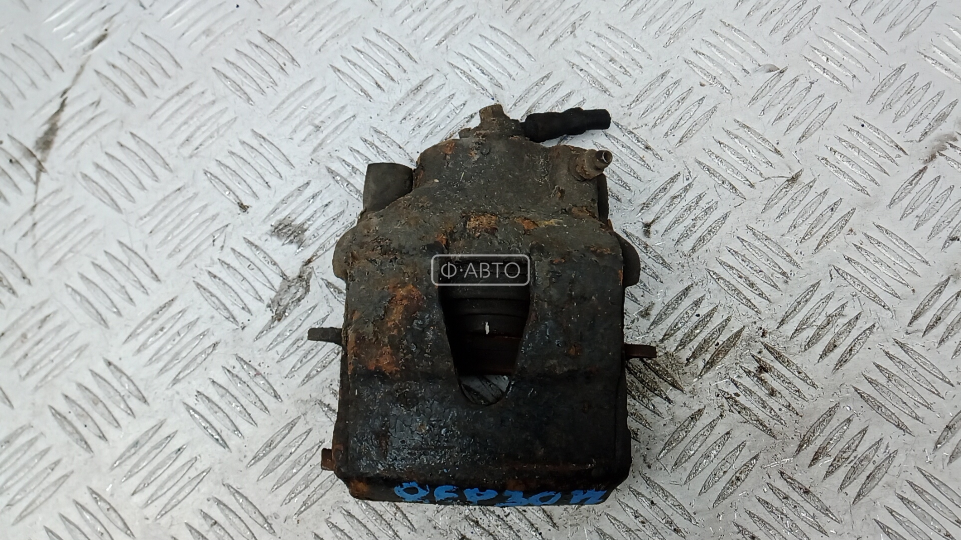 Суппорт тормозной передний левый