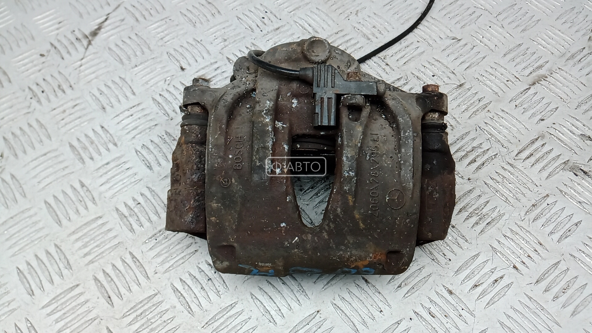 Суппорт тормозной передний левый