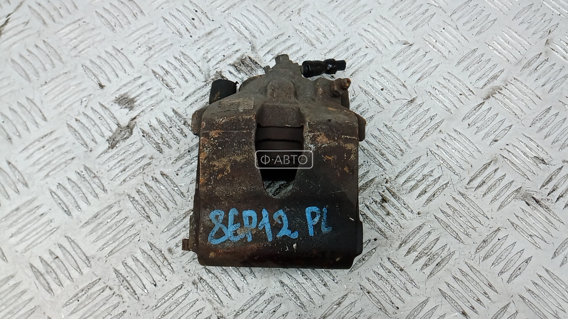 Суппорт тормозной передний левый