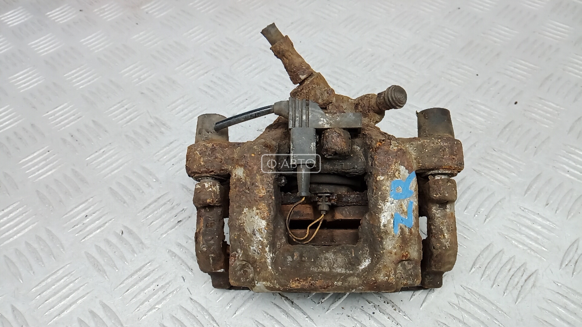 Суппорт тормозной задний правый