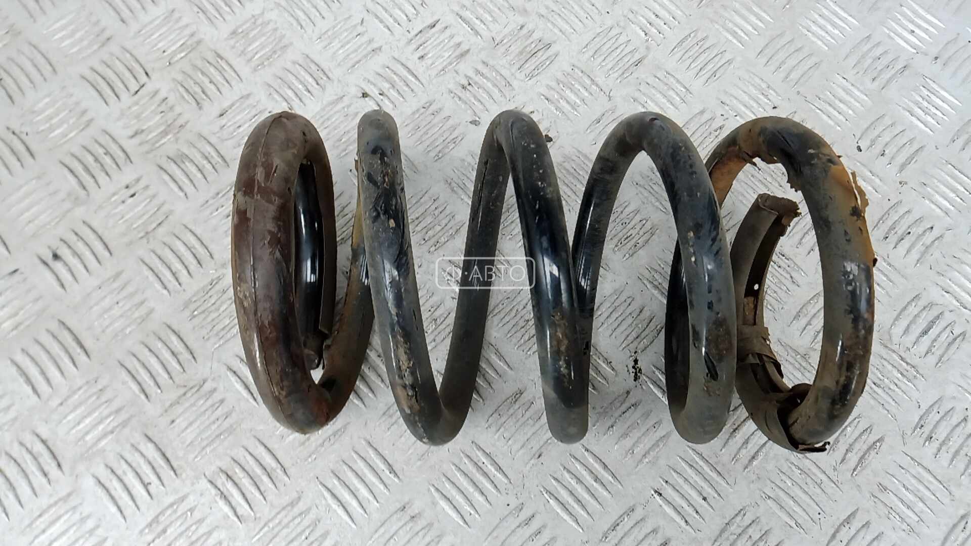 Пружина задняя