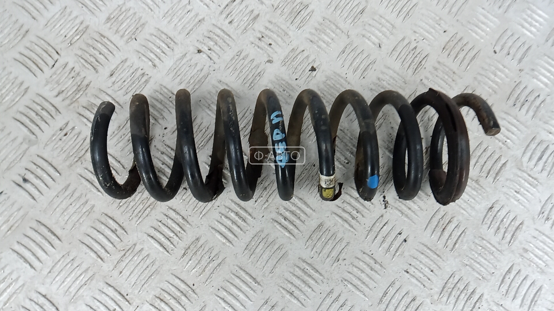 Пружина задняя