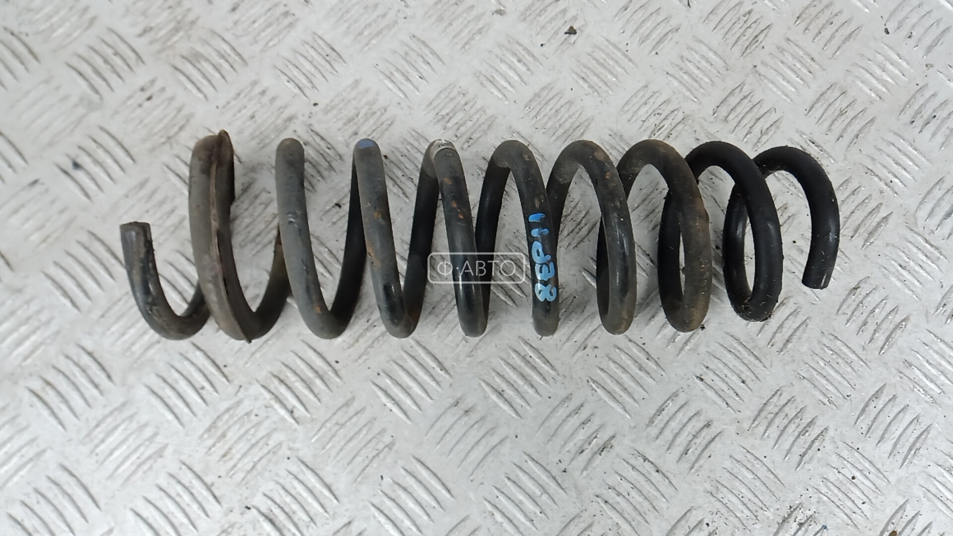 Пружина задняя